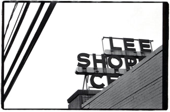 Cynthia Connolly, Lee Shopping Center, Arlington, Virginia 5-08 (Letters on Top of Buildings Grab Bag series)